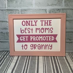 Only the best moms get promoted to granny wood A framed sign.